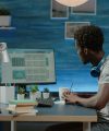 Black man looking at stock market exchange information